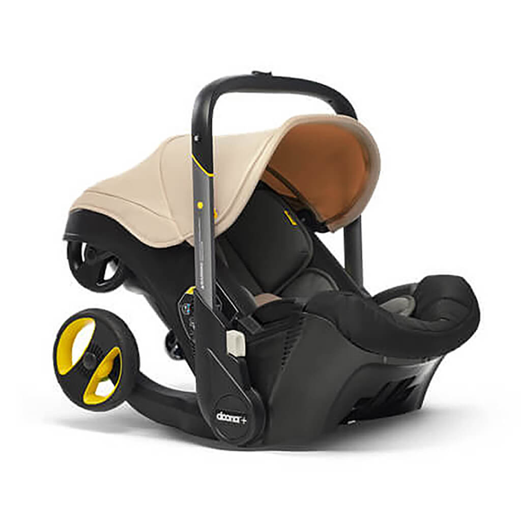 baby car seat stroller in one Doona Infant Car Seat & Stroller Sahara Sand